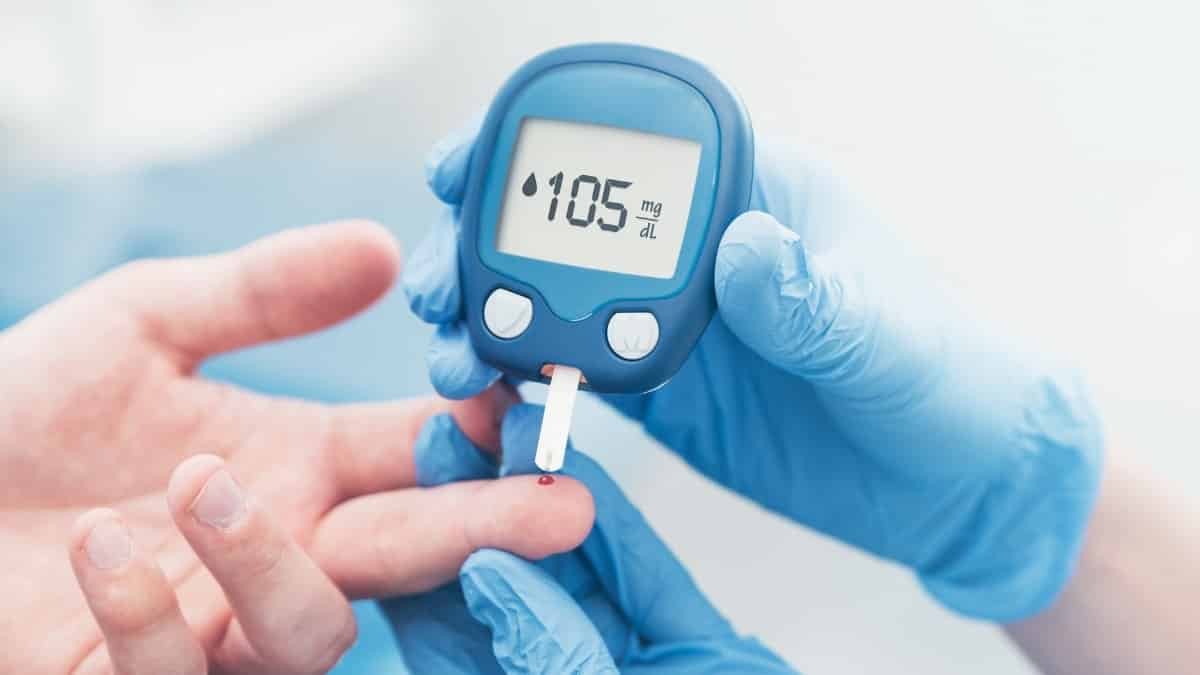 Person testing diabetes