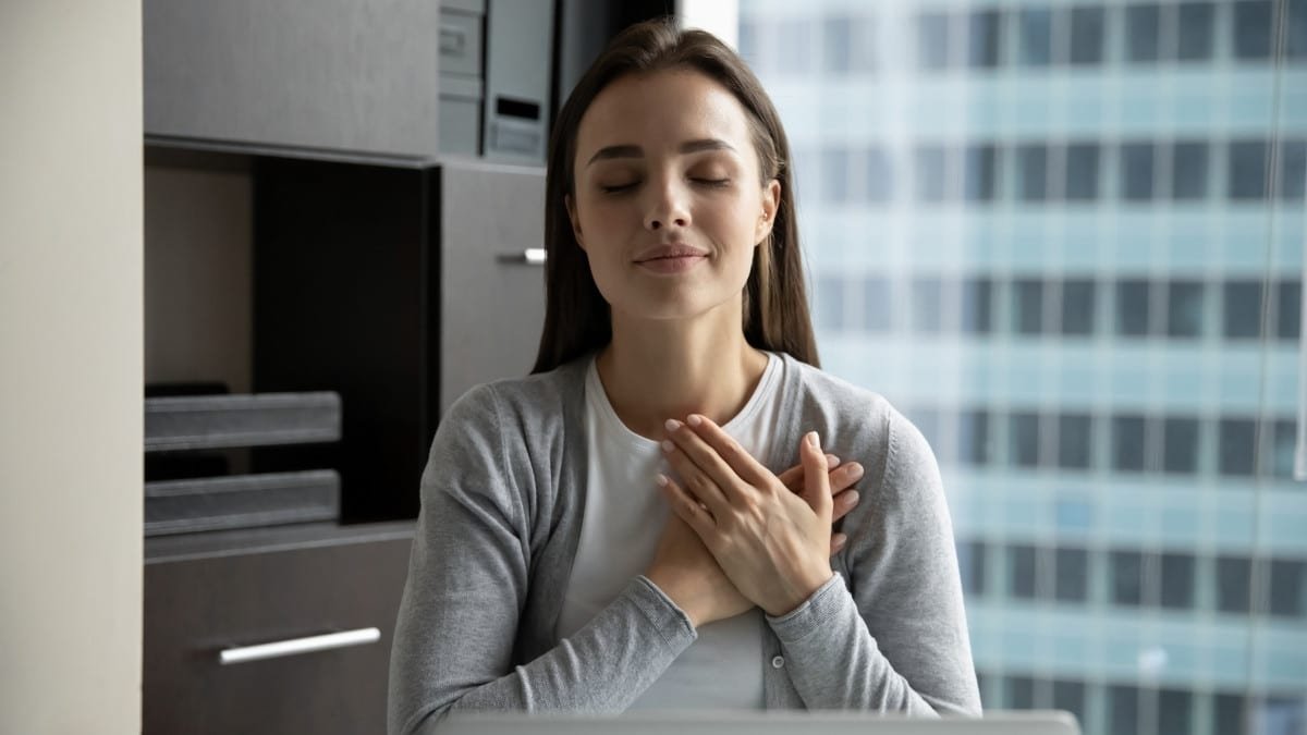 Woman at office relieving stress